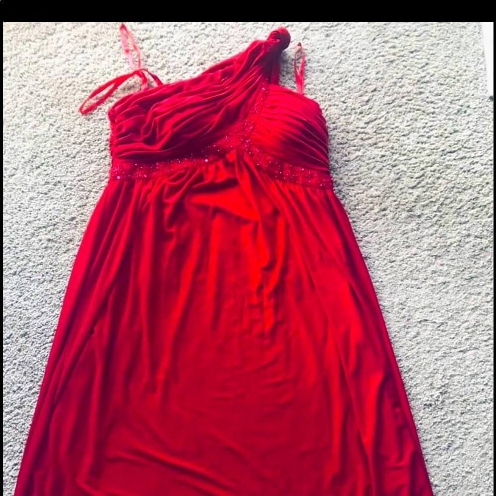 Beautiful red off shoulder dress. Never worn.